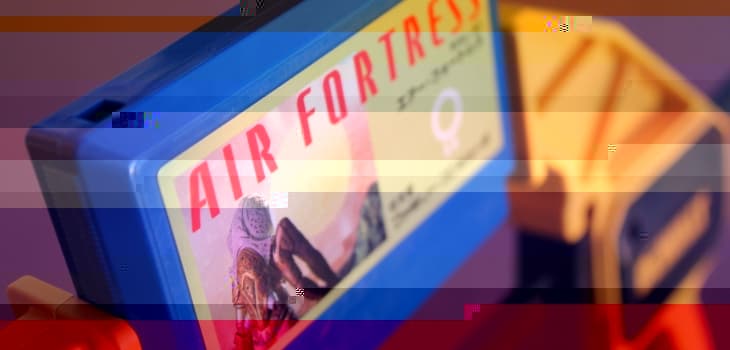 Use a trigger clamp to open your Famicom game cartridge