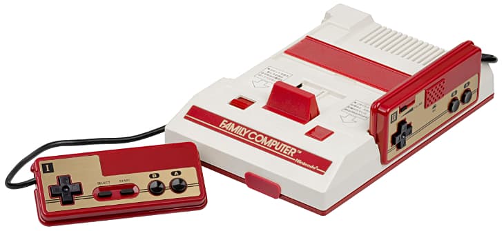 Famicom console with controller Famicom console with controller