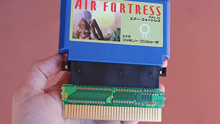 Famicom cartridge on Gyromite adapter